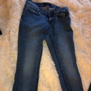 dark wash jeans with pocket detail